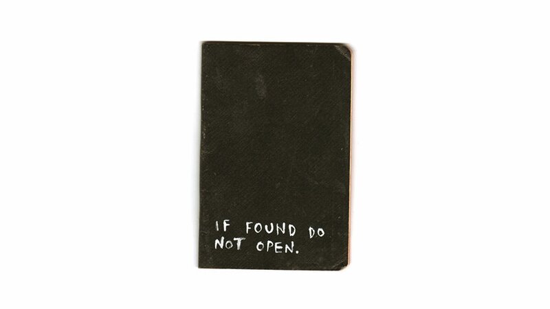 black notebook with text