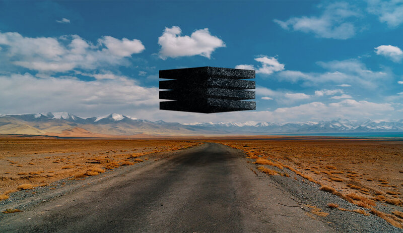 Black Object in Desert