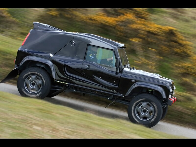 black off-road vehicle in motion