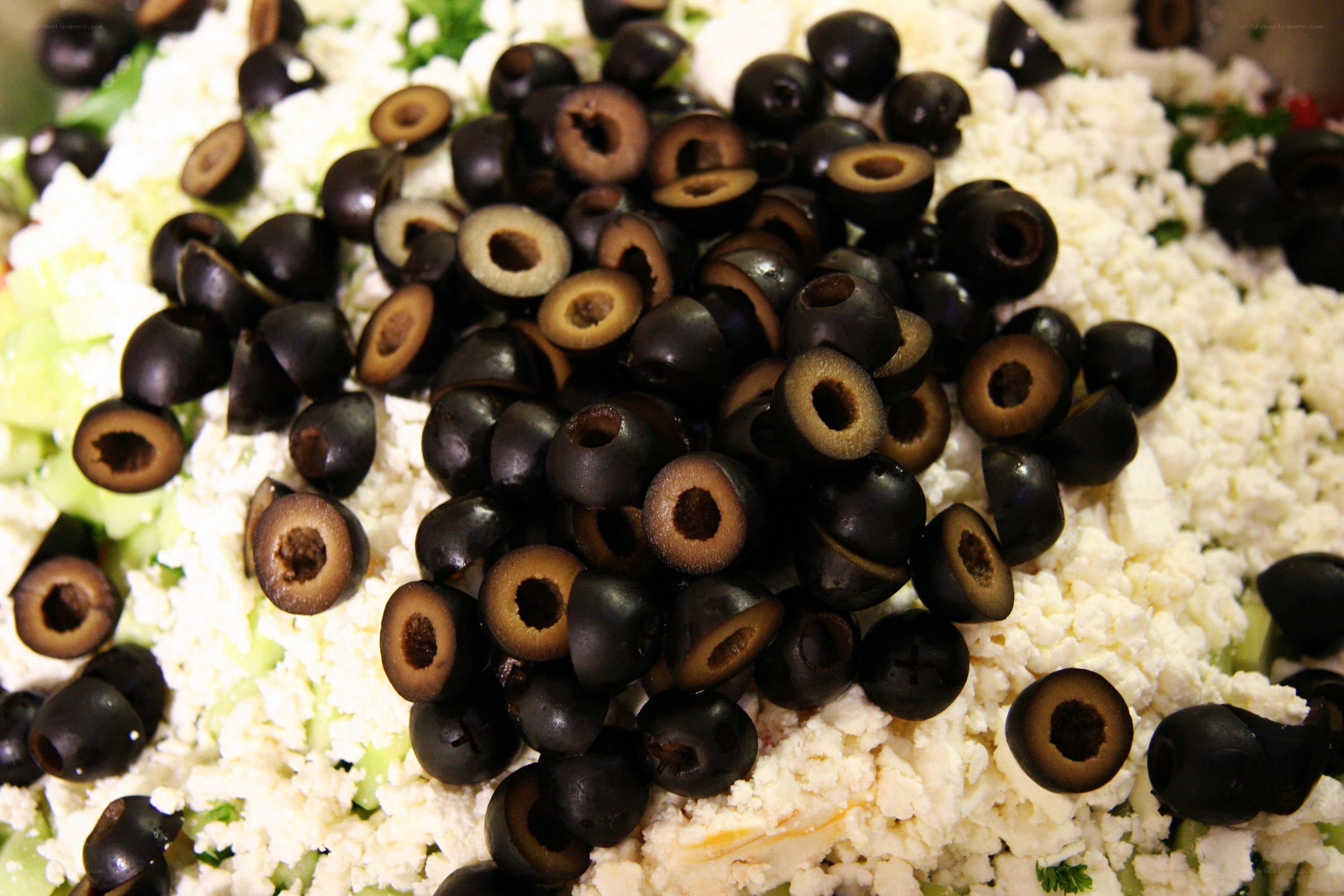 black olives on salad