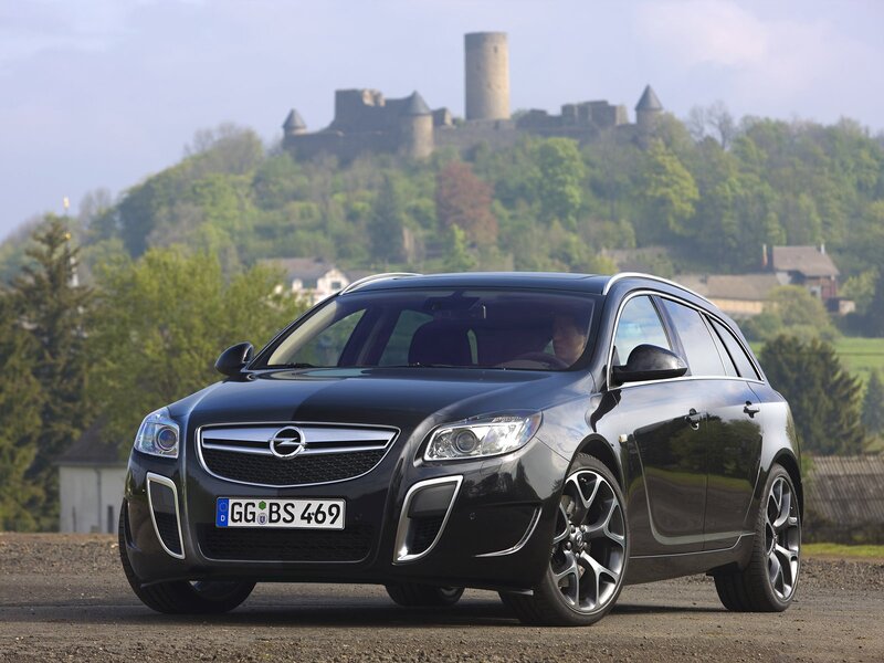Black Opel In Front of Castle