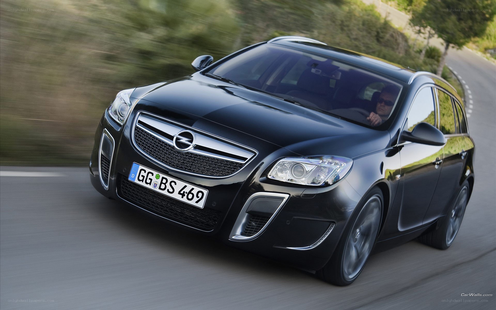 black opel in motion