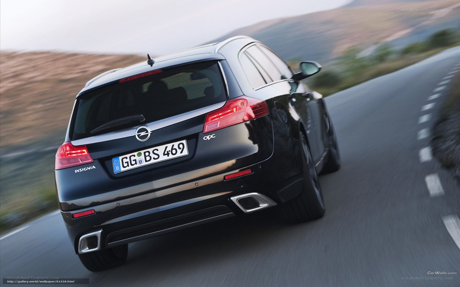 black opel insignia driving