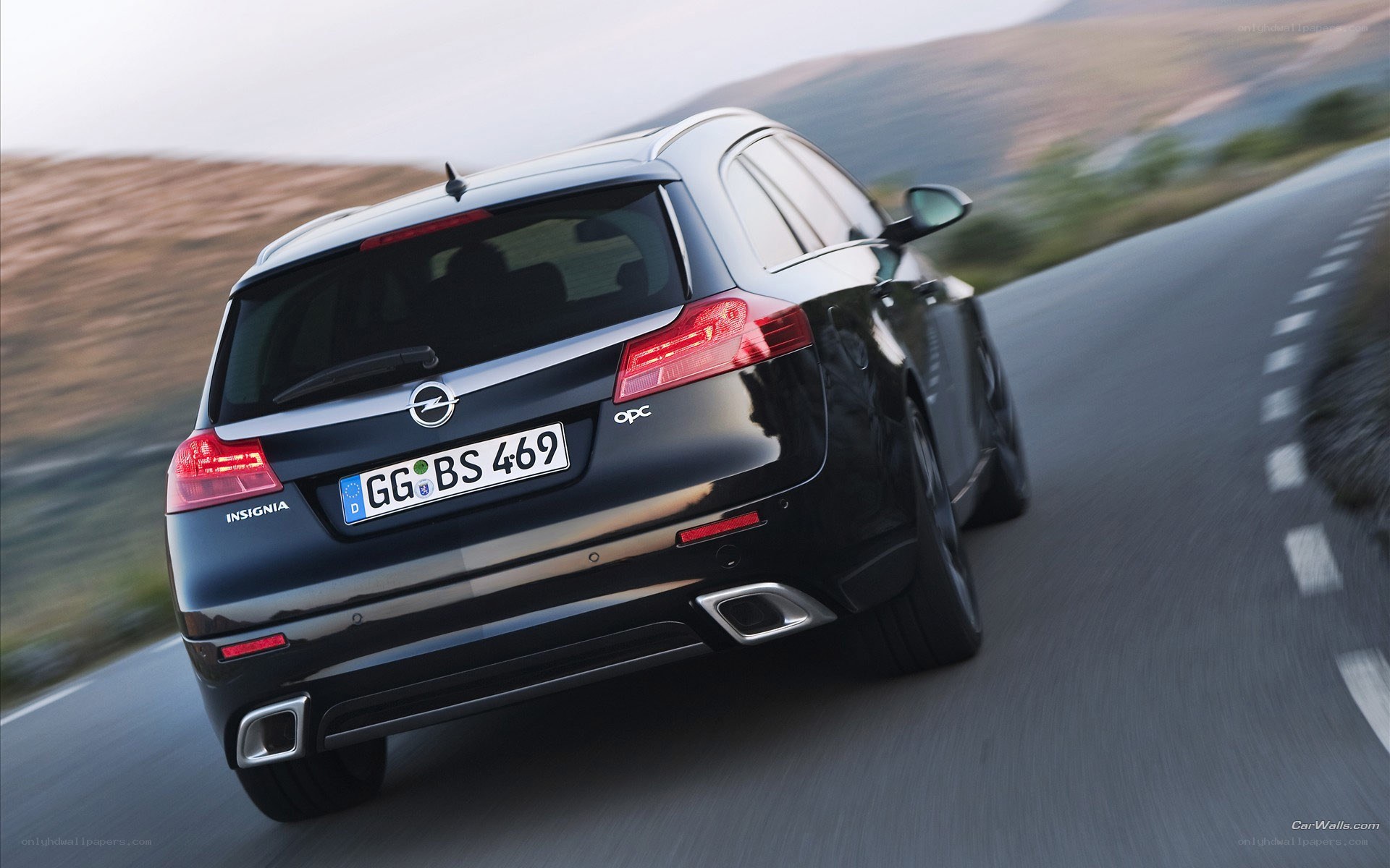 black opel insignia on road