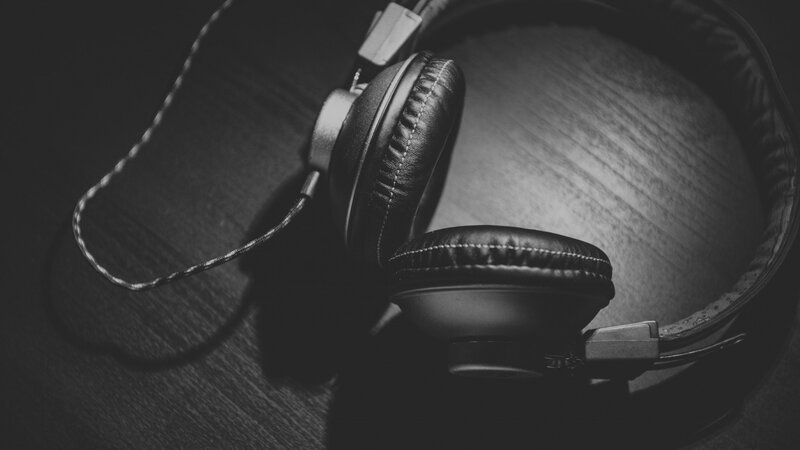 Black Over-ear Headphones — Dramatic, Photograph, Wooden Surface