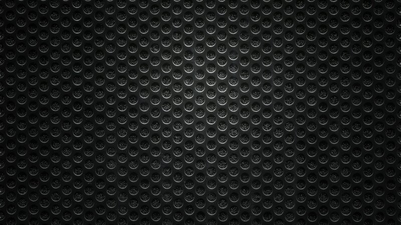 black perforated metal surface