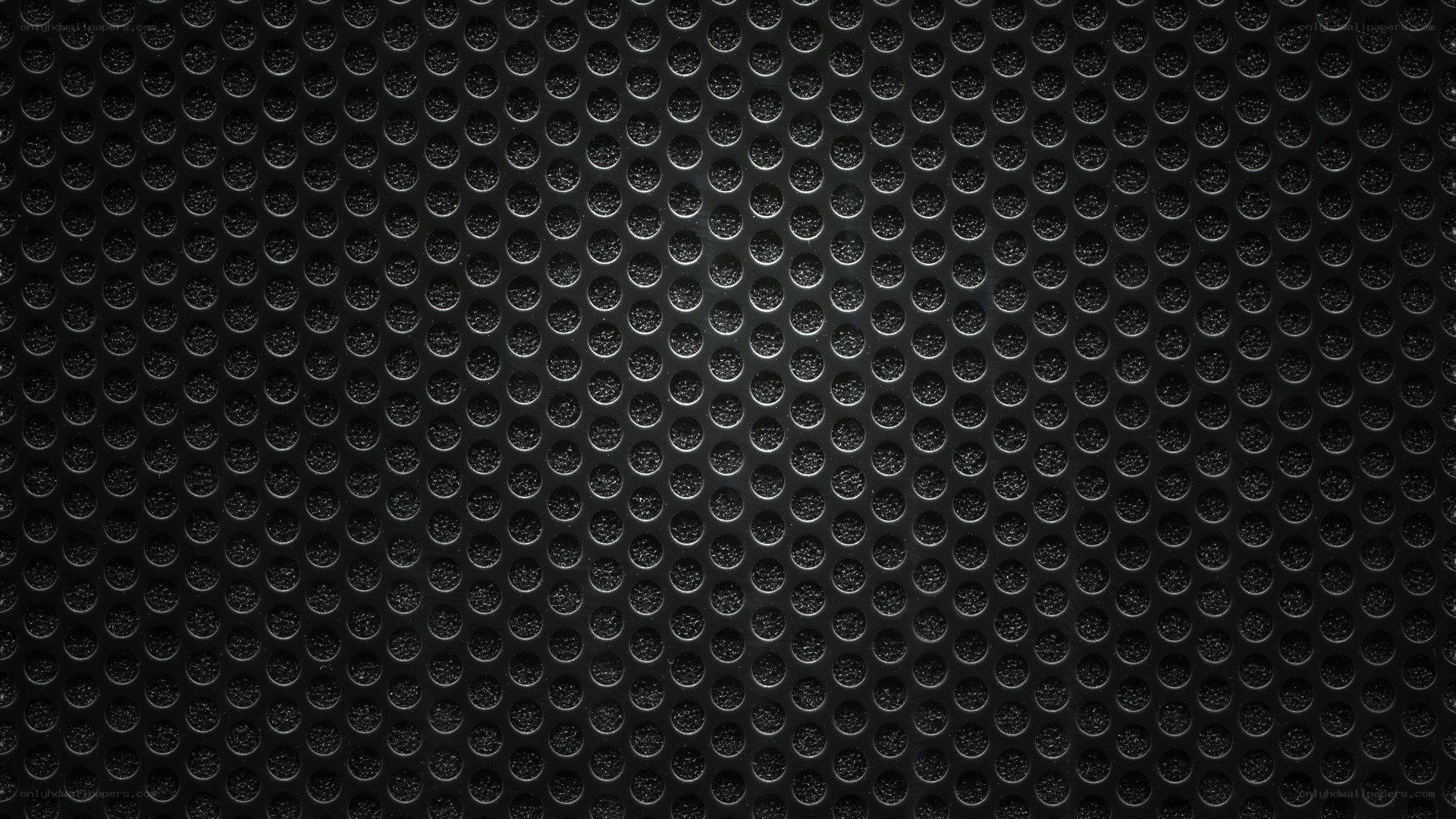 black perforated metal surface