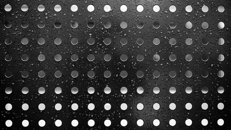 Black Perforated Metal Surface — Neutral