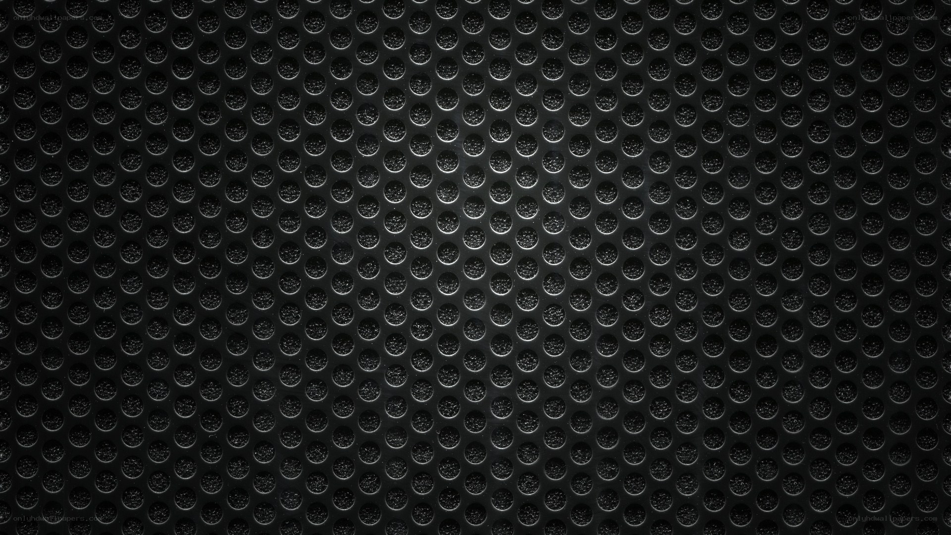 black perforated metal surface