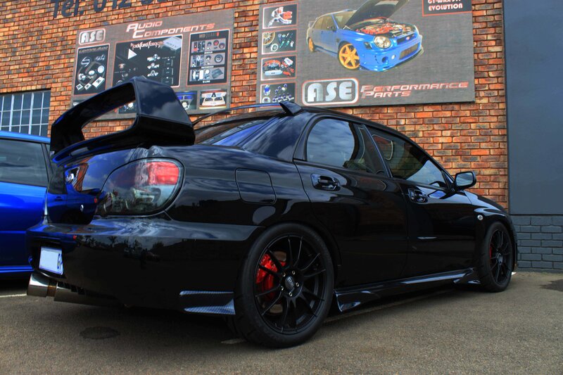 Black Performance Car — Dramatic, Afternoon