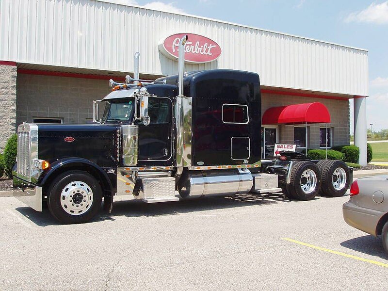 black peterbilt truck at dealership