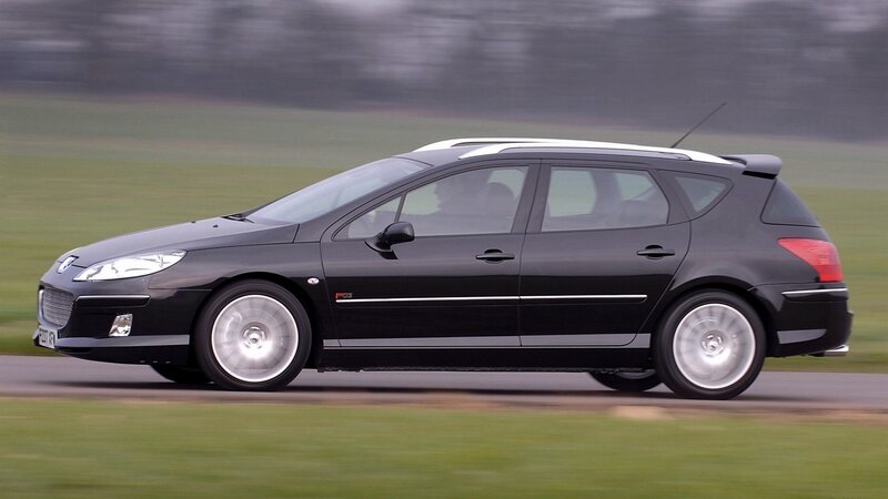 black peugeot 307 sw in motion