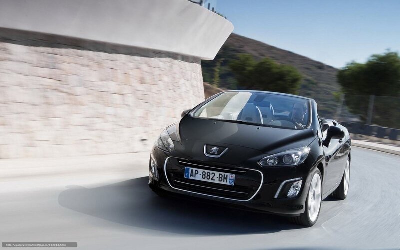 Black Peugeot 308 CC driving