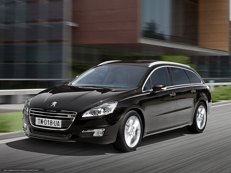Black Peugeot 508 SW in motion