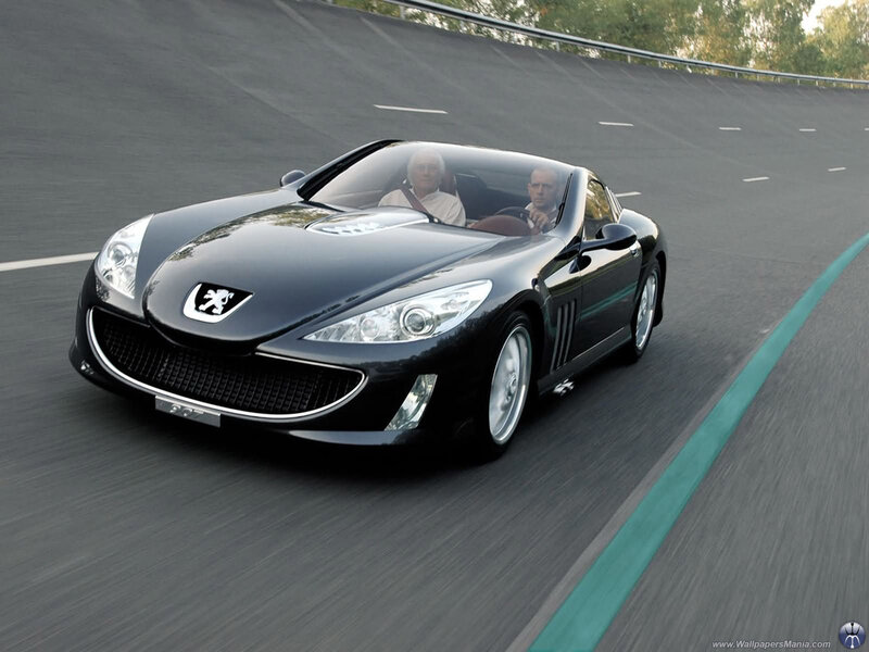 Black Peugeot concept car on track