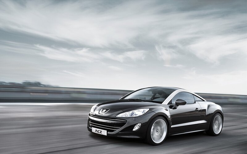 Black Peugeot RCZ in motion