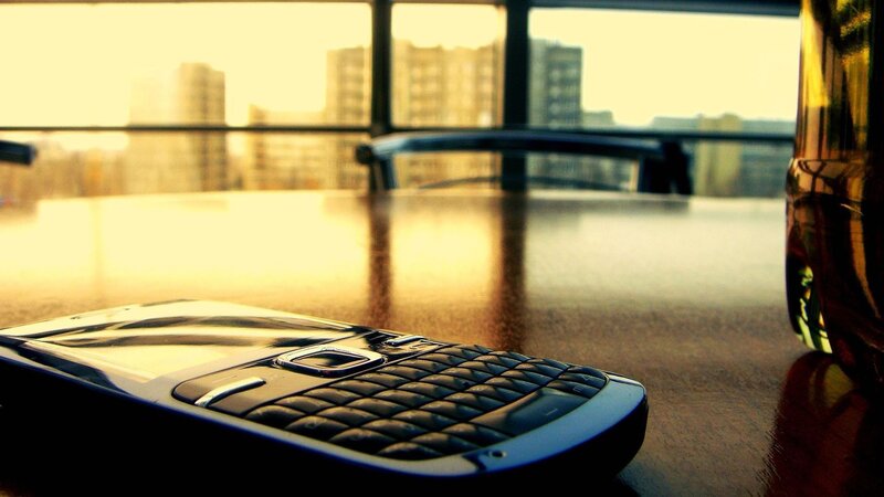 Black Phone on Table — Brown, Calm