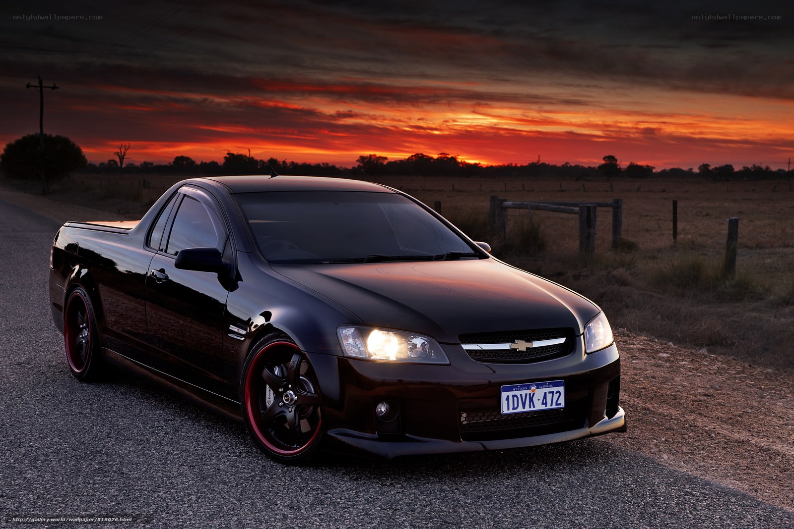 Black pickup at sunset