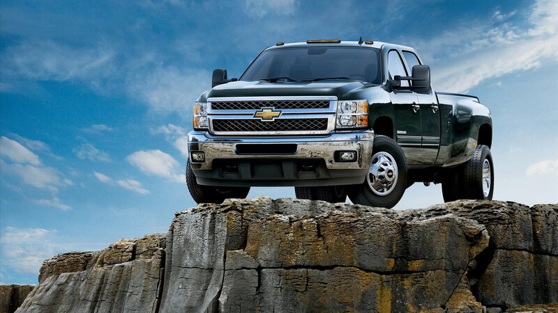 Black Pickup Truck — Dramatic, Afternoon, Photograph, Rocky Cliff, Blue Sky