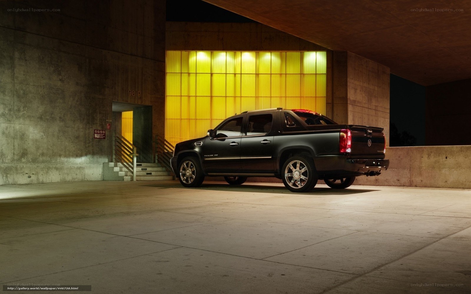 Black pickup truck in garage
