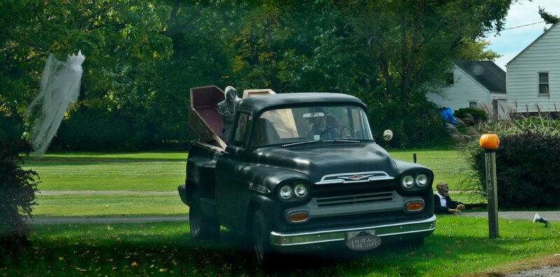 Black Pickup Truck with Coffin