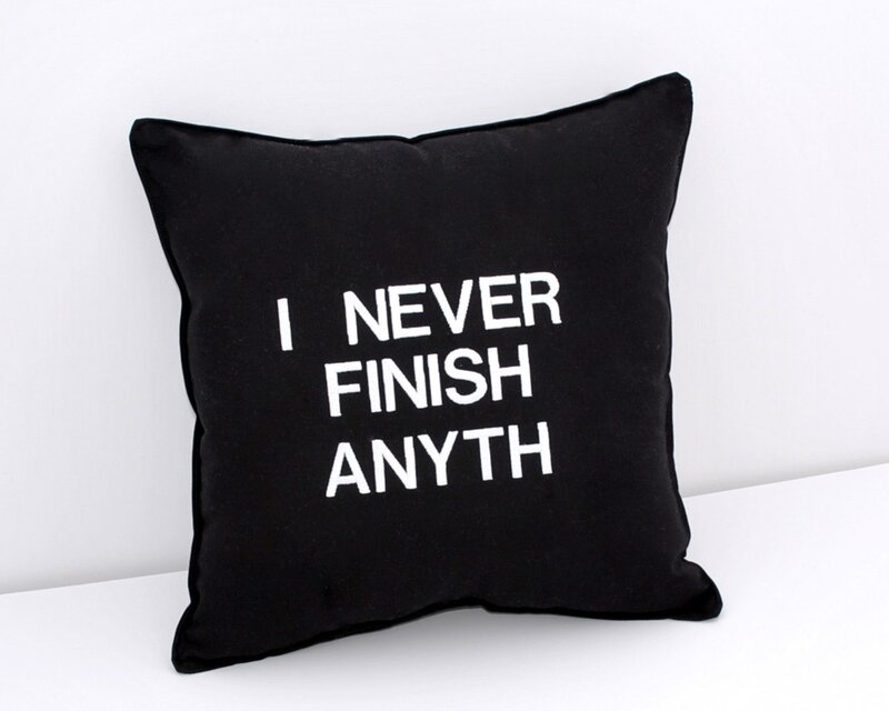 black pillow with text