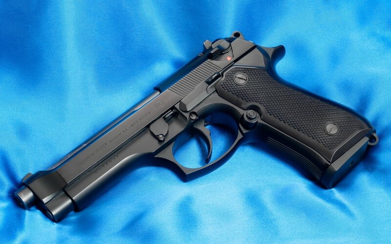 Black Pistol on Blue Cloth — Neutral, Photograph, Blue Fabric, Gun