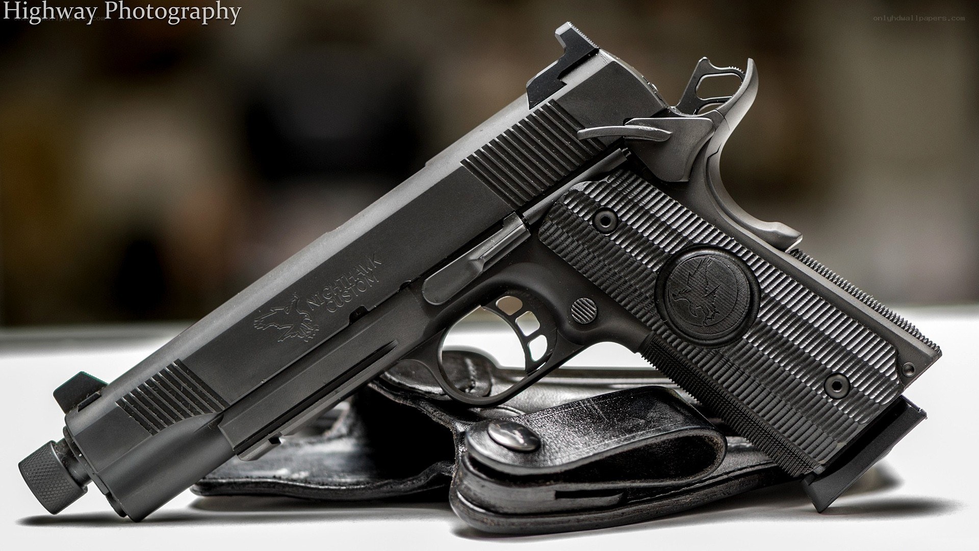 black pistol on holster