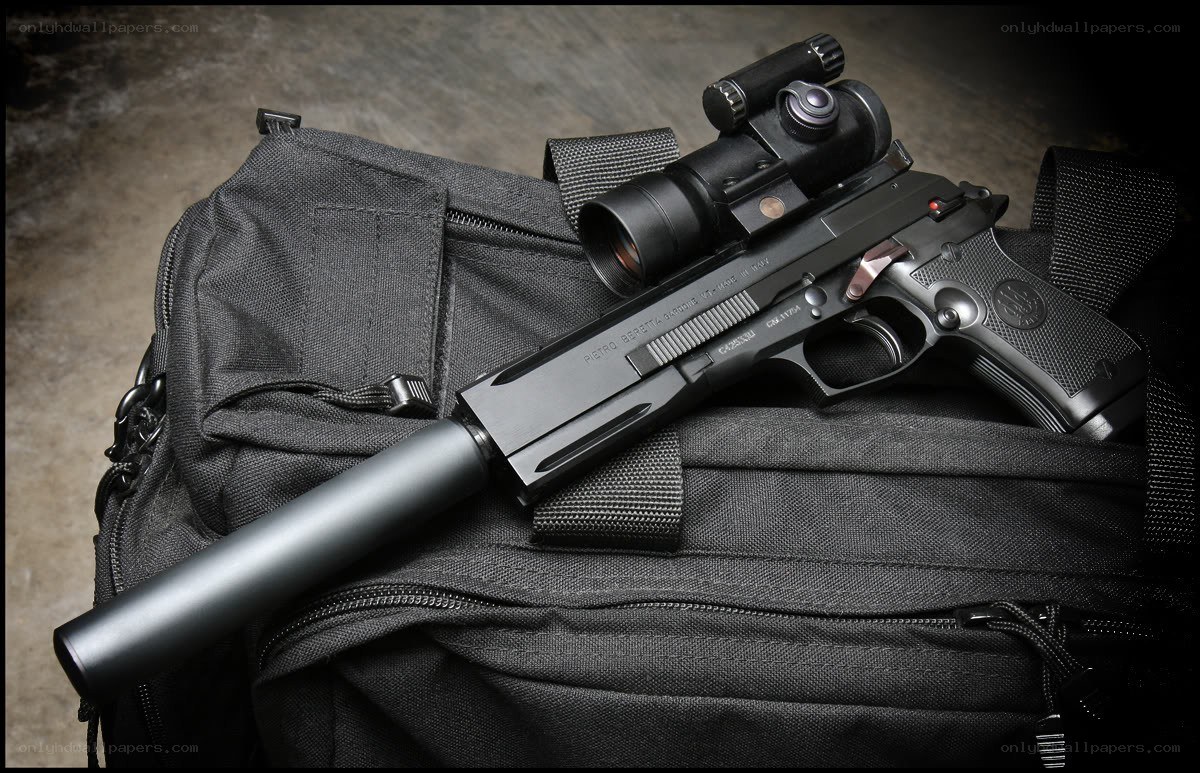 Black pistol with scope and suppressor