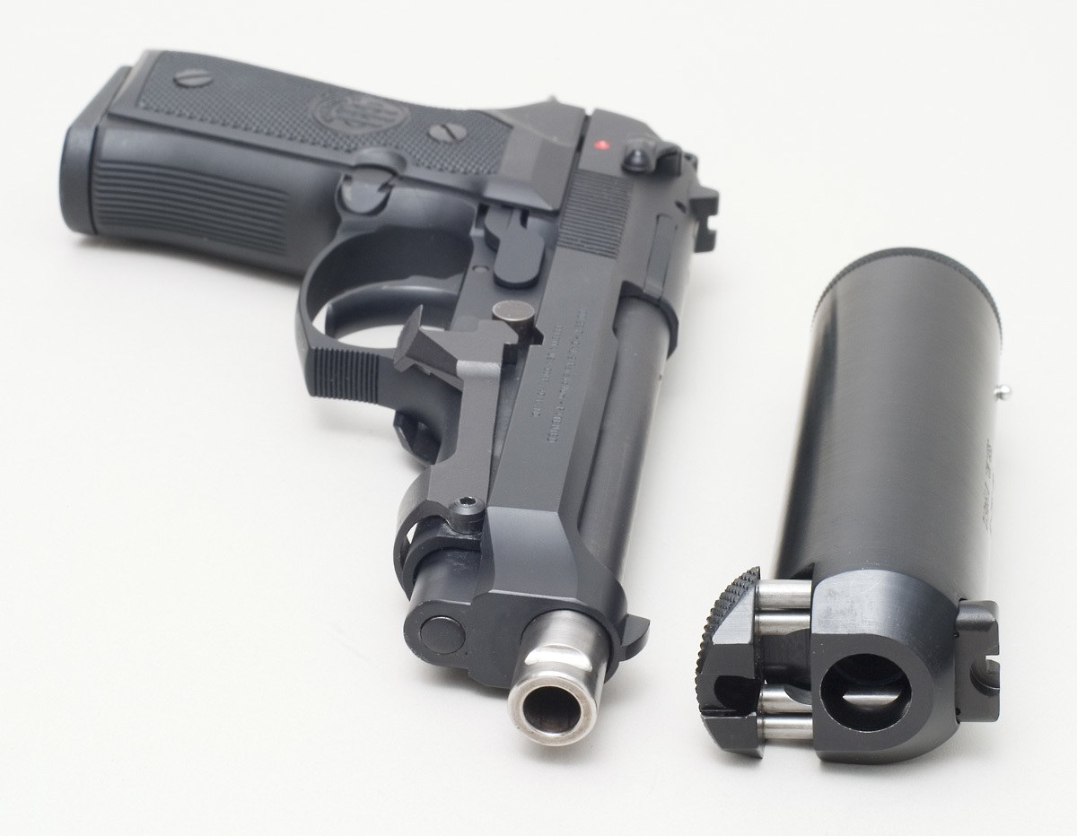 black pistol with suppressor
