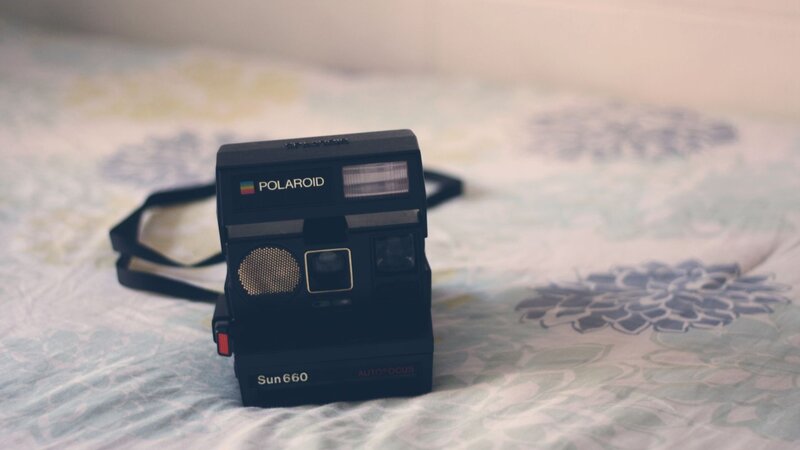 Black Polaroid Camera — Calm