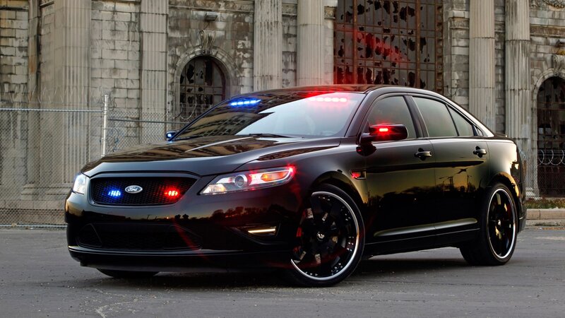 Black Police Car — Dramatic, Night, Photograph, Building, Chain-link Fence