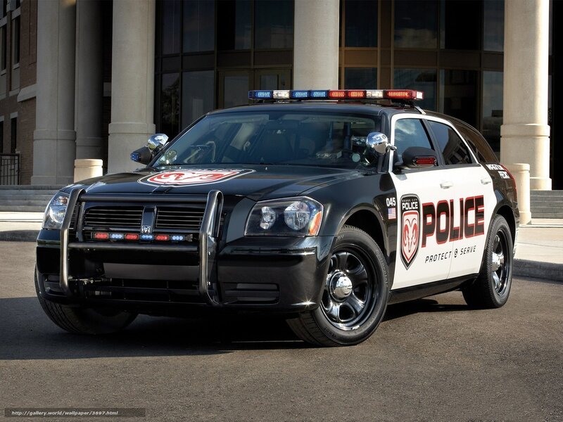 black police car in front of building