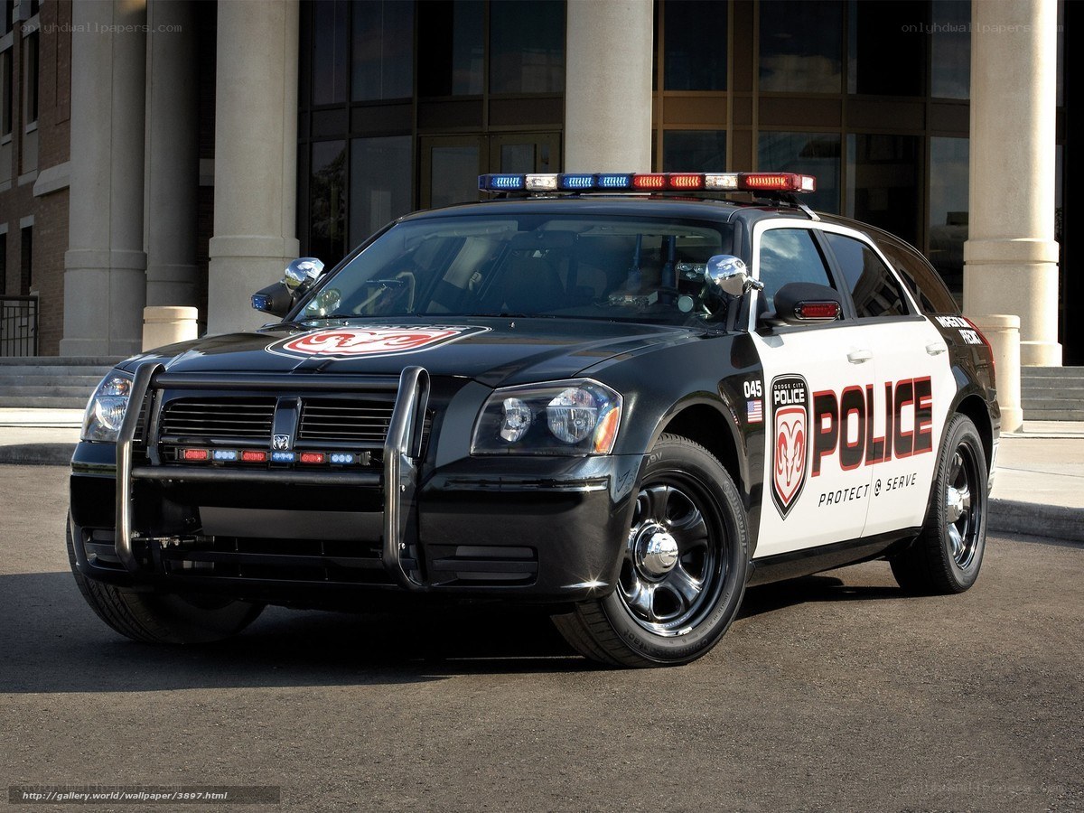 black police car in front of building