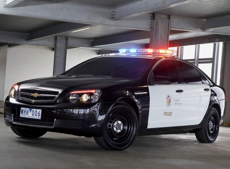 black police car in garage