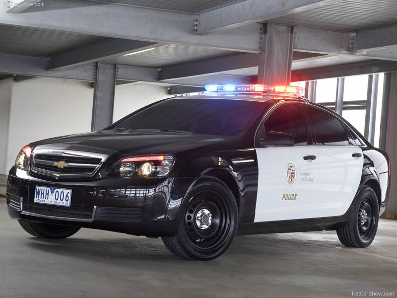 black police car in garage