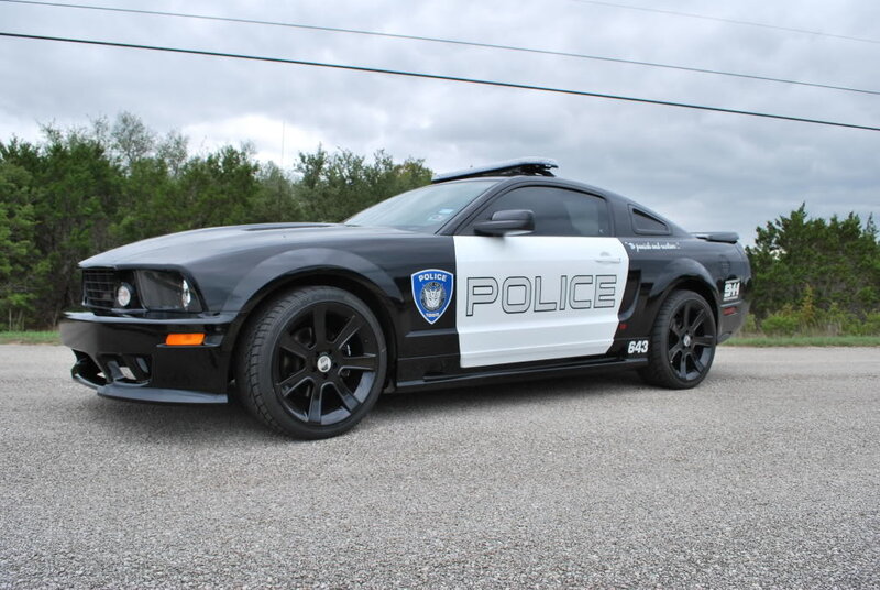 black police car on road