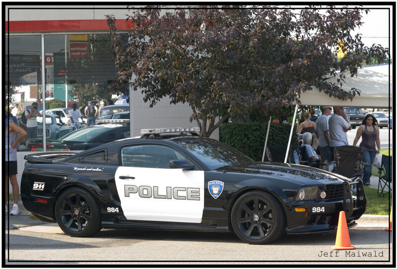 Black Police Car — Outdoor, Afternoon