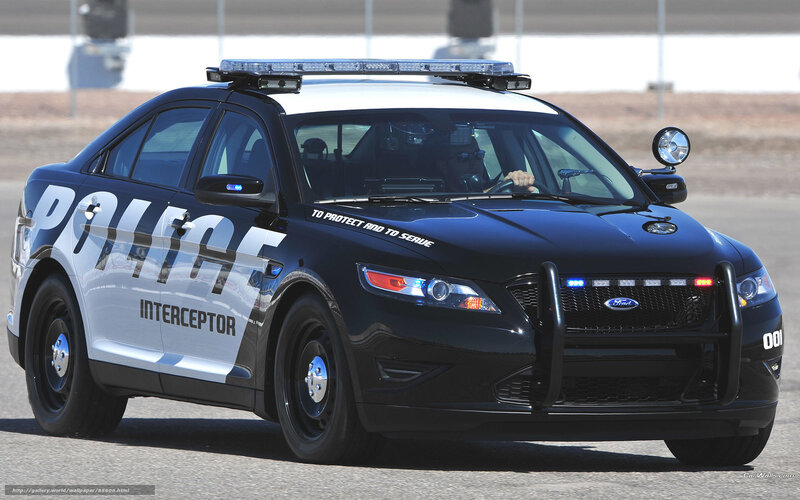 Black police interceptor car