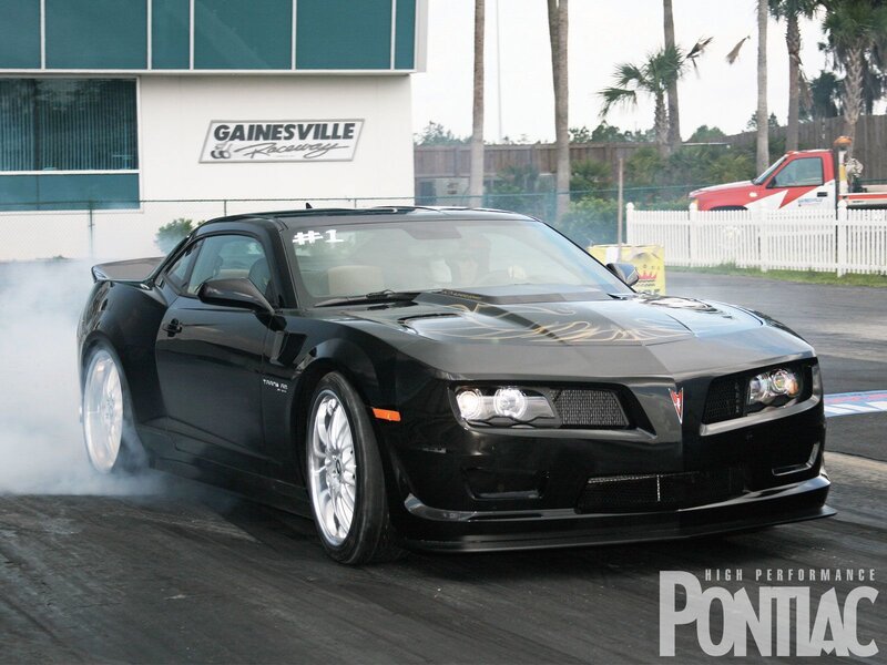 Black Pontiac Camaro drag racing