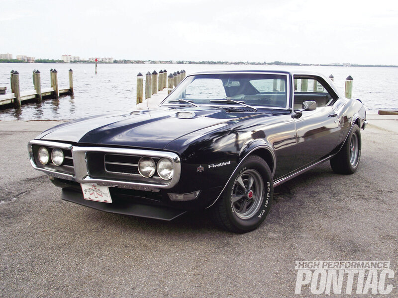 Black Pontiac Firebird — Calm, Afternoon, Photograph, Car, Dock