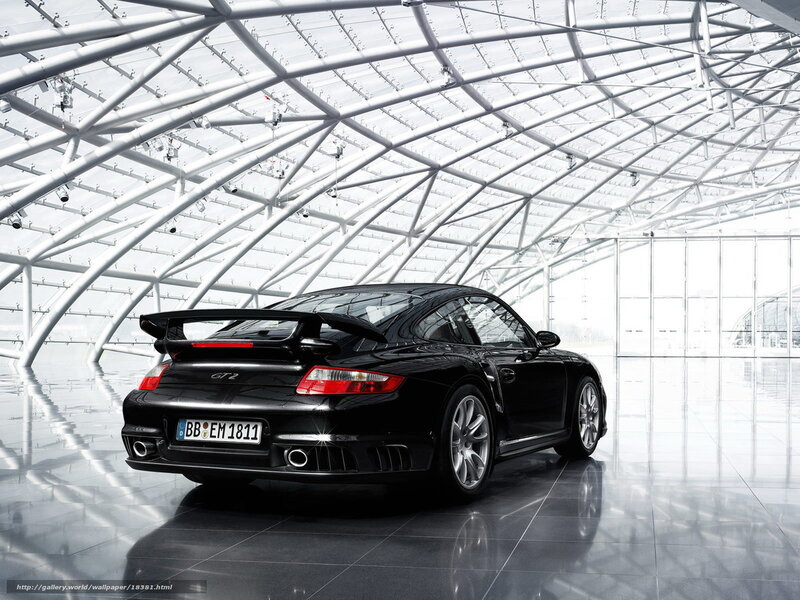 Black Porsche 911 GT2 in modern hall