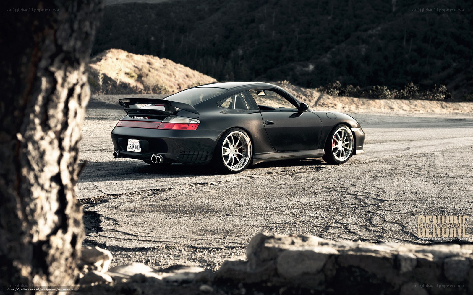 Black Porsche 911 on a road