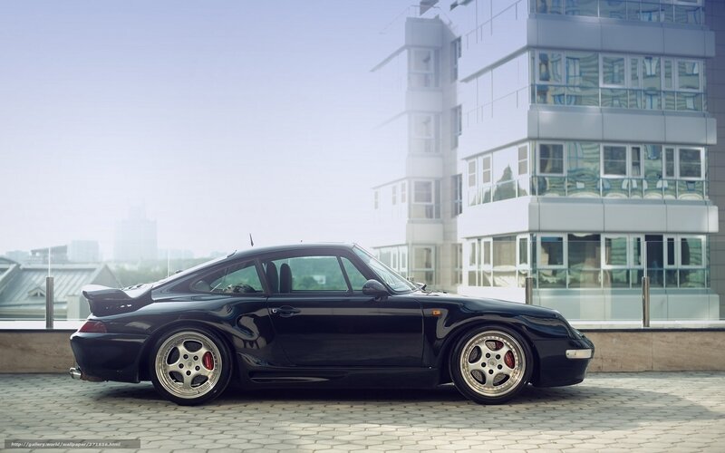 Black Porsche 911 on rooftop