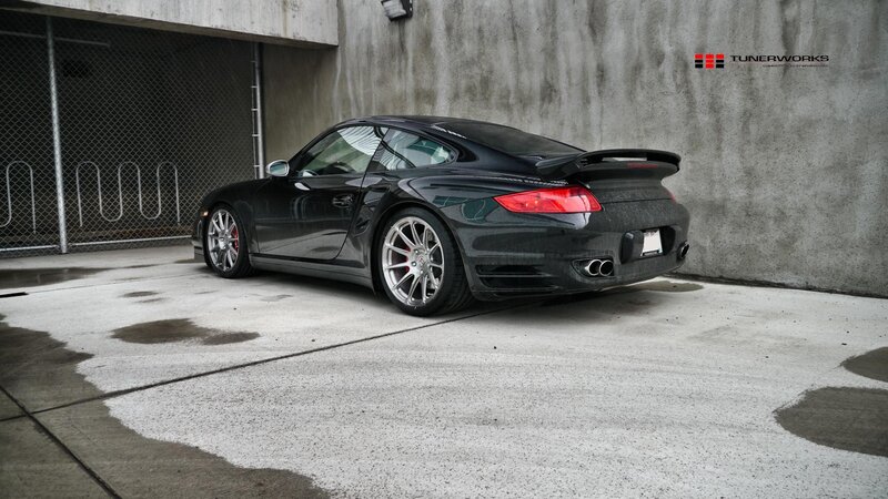 black porsche 911 parked in garage