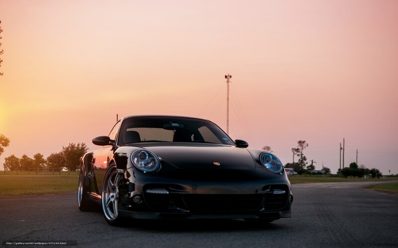 Black Porsche at sunset