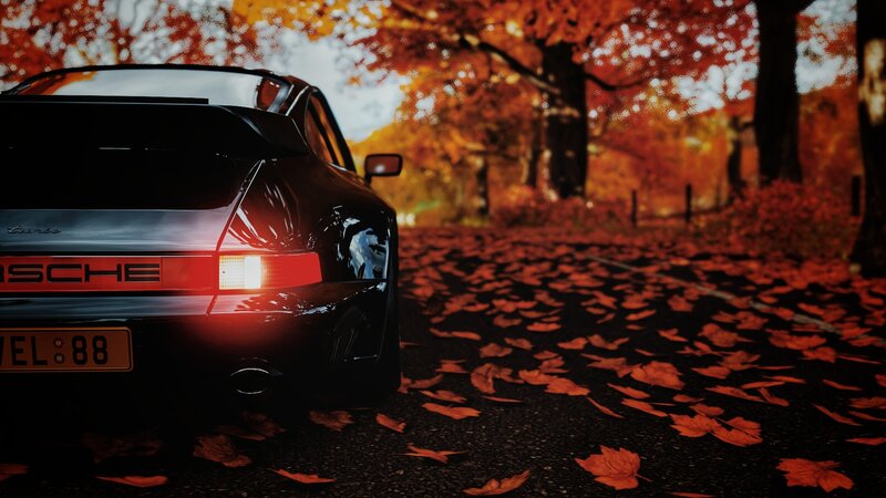 Black Porsche Car — Red