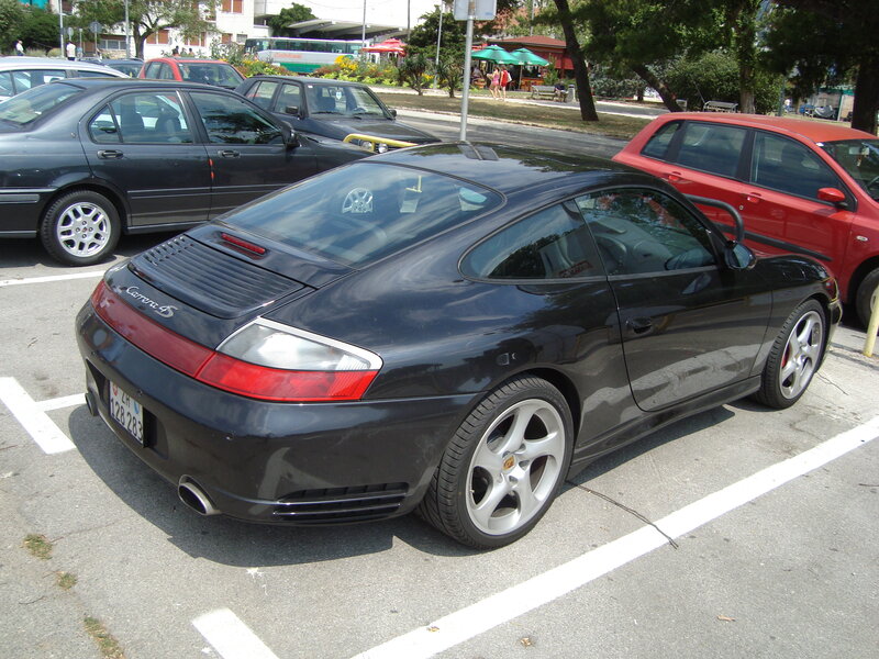 Black Porsche Carrera parked