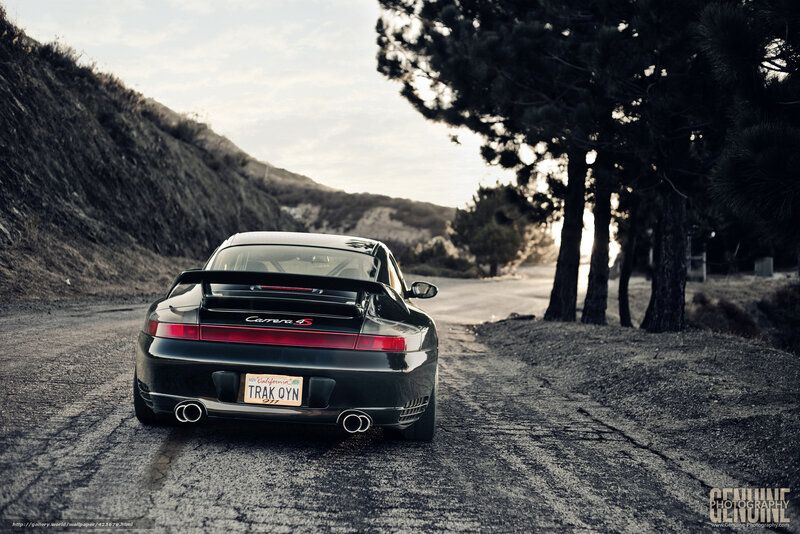 Black Porsche Carrera S on a road