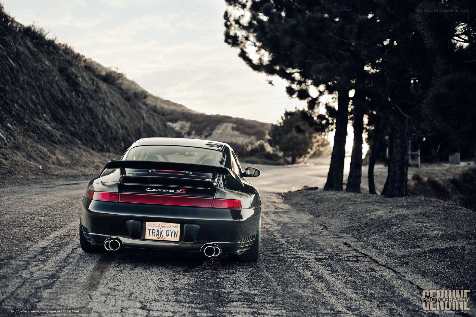 Black Porsche Carrera S on a road
